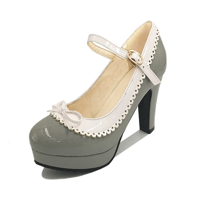 Bowtie Round Toe Heeled Pumps